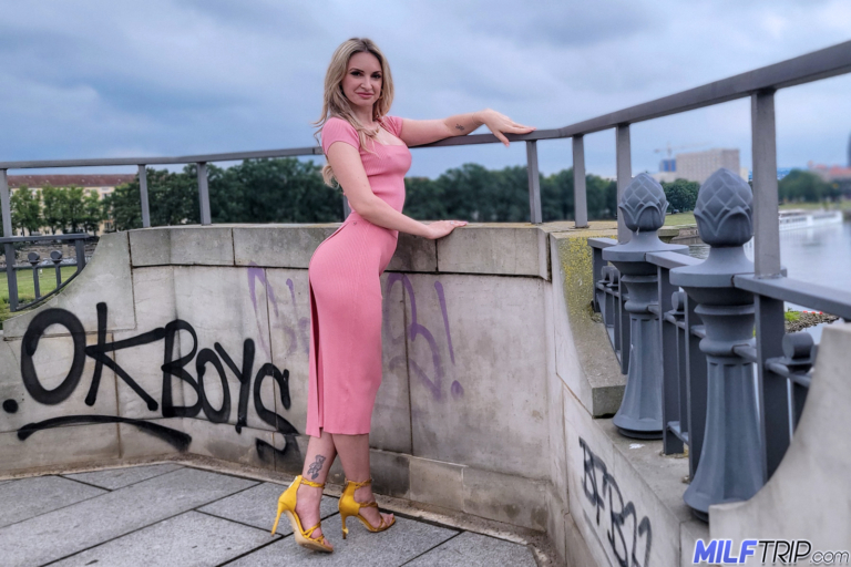 Hung stud spots shapely German milf in pink dress and pumps